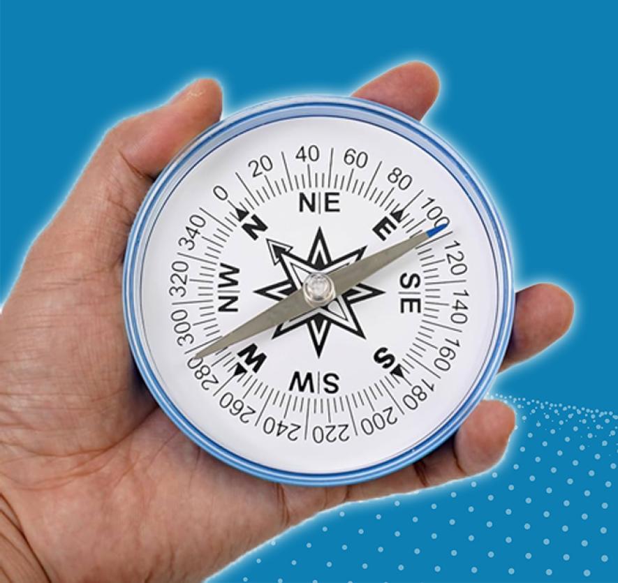 IV: Hand mit Kompass Bild | macs Software GmbH
